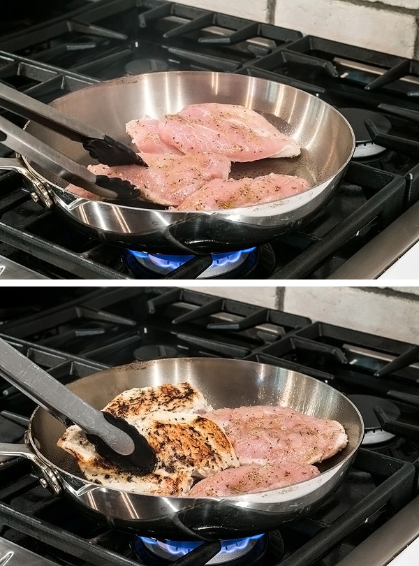 chicken breast being browned in a pan