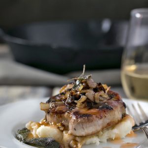 Sage and Rosemary Pork Chops with Peach Cider Sauce