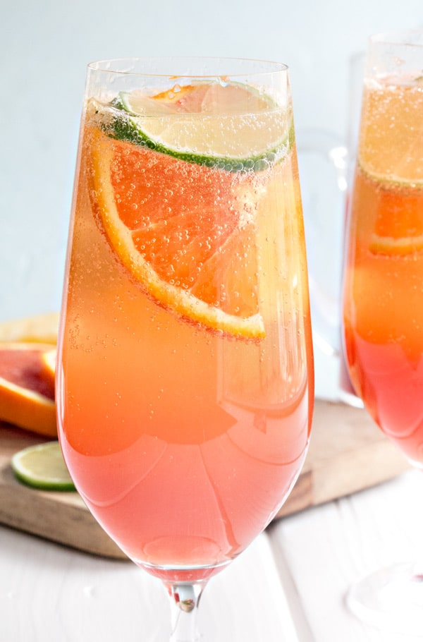 a single close up glass of planters punch where you can see all the bubbles in the glass!