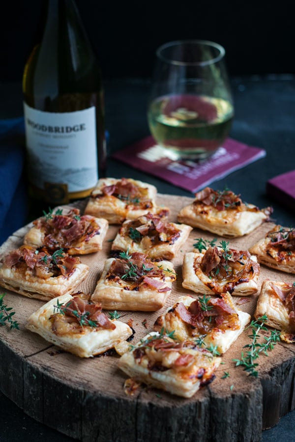 Puff Pastry Tartlets with Caramelized Onion, Wine, Cheddar, & Prosciutto