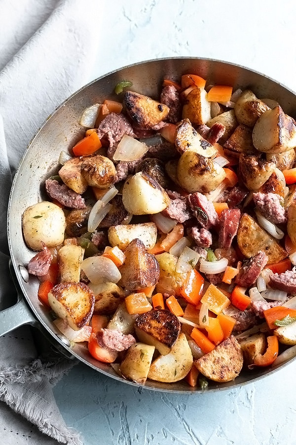 potato hash all mixed together in a skillet